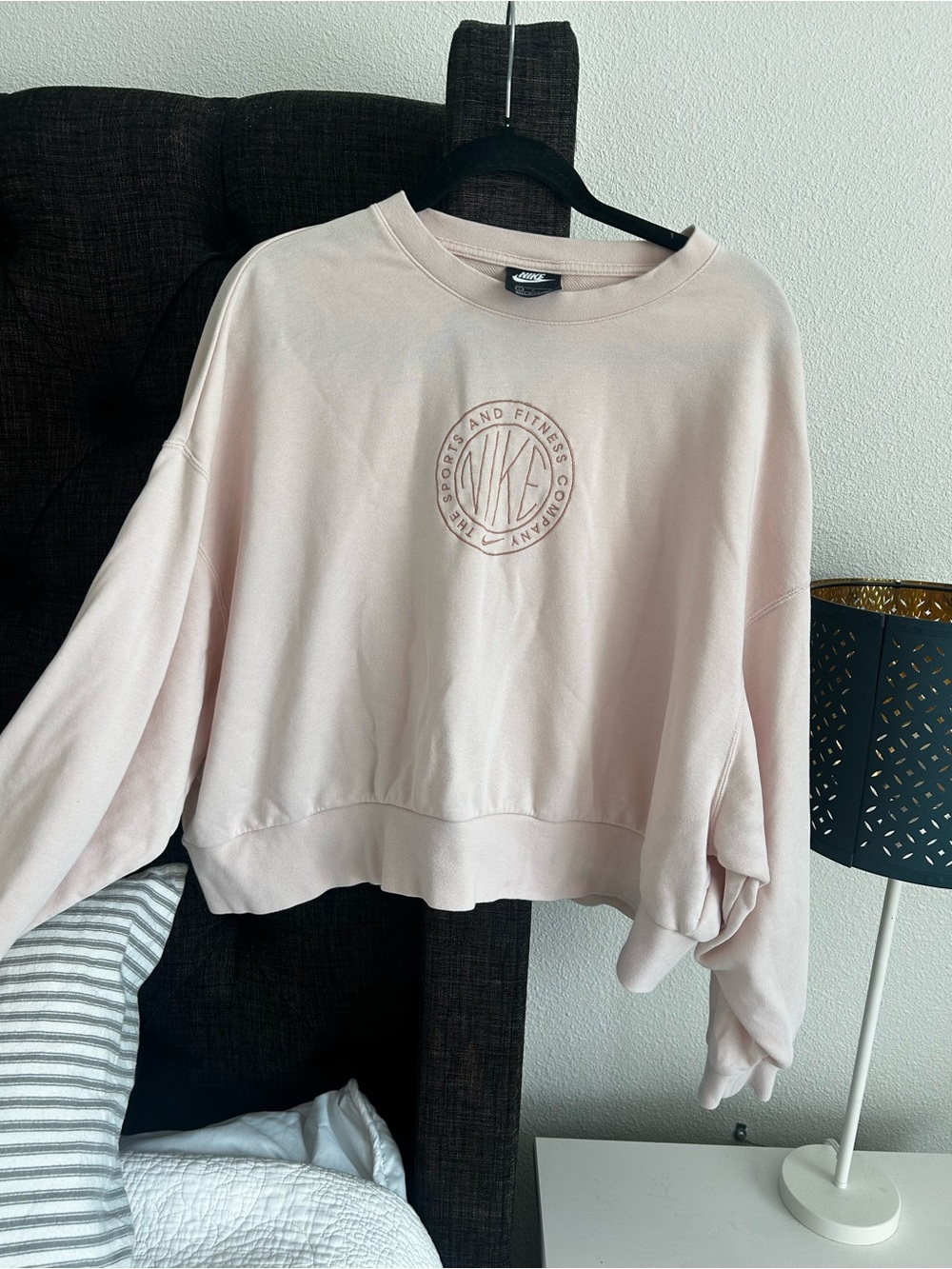 Nike Women's Light Pink Embossed Logo Crewneck Sweatshirt